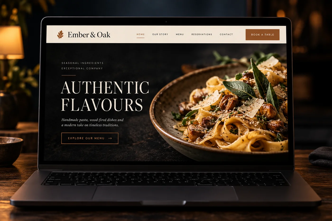Ember & Oak fictional restaurant website on a laptop